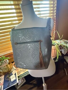 The Sak Gray Embossed Leather Shoulder Bag with Brown Tassel